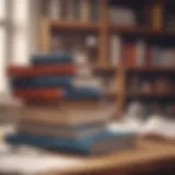 A stack of influential business books on a desk