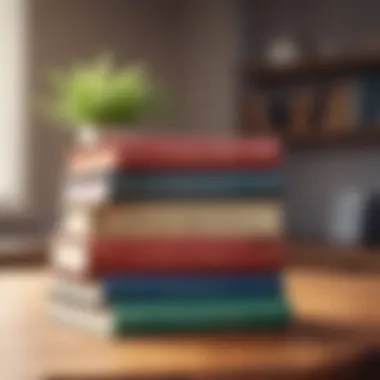 A stack of influential leadership books on a wooden desk