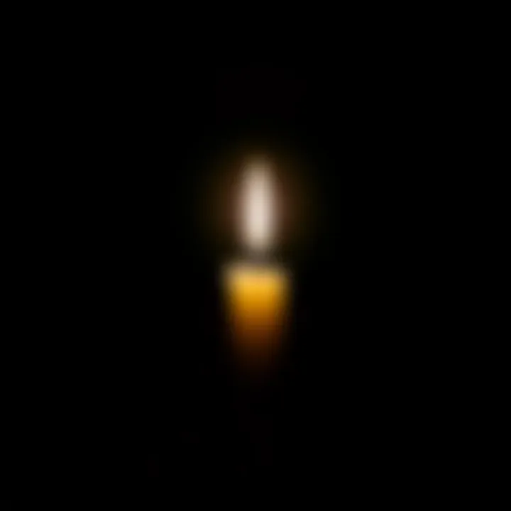 Light in Darkness A candle burning brightly in the dark illustrating hope and resilience