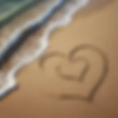 A close-up of a heart drawn in the sand near the ocean