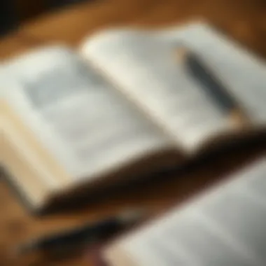 A notebook with reflective thoughts beside an open book