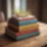 A stack of influential psychology books on a wooden desk